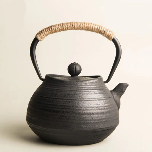 Cast Iron Tea Kettle with Spiral Pattern Design